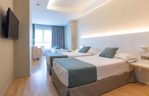 Habitación Triple del hotel Olympia Events and Spa. Foto 2