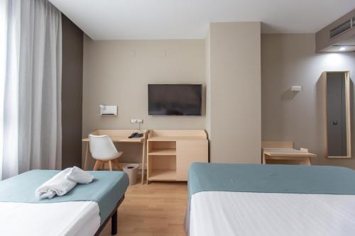 Habitación Triple del hotel Olympia Events and Spa. Foto 4