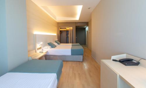 Habitación Triple del hotel Olympia Events and Spa. Foto 5