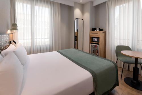 Habitación Doble Premium - 1 o 2 camas del hotel Catalonia Excelsior. Foto 1