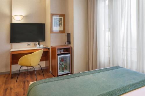 Habitación Individual del hotel Catalonia Excelsior. Foto 3