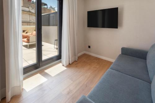Suite Junior con terraza del hotel Catalonia Excelsior. Foto 1