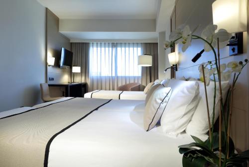 Habitación Triple del hotel Exe Rey Don Jaime