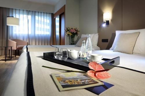 Habitación Triple del hotel Exe Rey Don Jaime. Foto 3