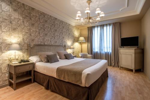 Habitación Vincci con cama supletoria del hotel Vincci Lys