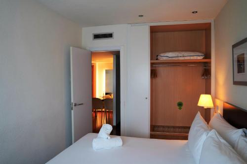 Habitación Cuádruple del hotel Port Feria Valencia. Foto 1