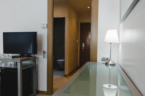 Habitación Triple del hotel Mas Camarena. Foto 3