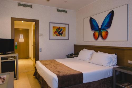 Habitación Triple adaptada para personas con movilidad reducida del hotel Mas Camarena