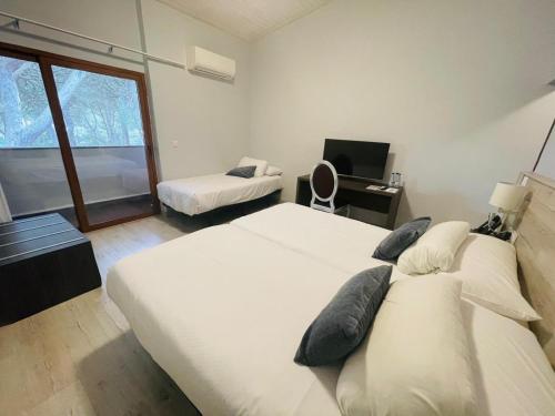 Habitación Triple del hotel Restaurante El Montico