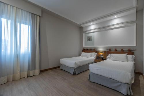 Habitación Doble del hotel Olid. Foto 13