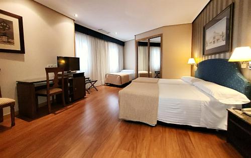 Habitación Doble con cama supletoria del hotel Imperial. Foto 2