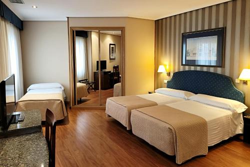 Habitación Doble con cama supletoria del hotel Imperial. Foto 4