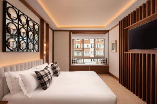 Habitación con vistas a la ciudad - Cama extragrande del hotel Ercilla De Bilbao, Autograph Collection. Foto 1