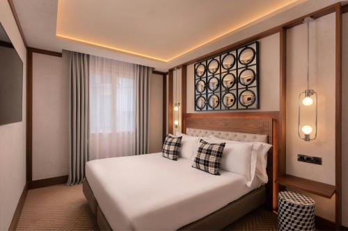 Habitación con sofá cama - Cama extragrande del hotel Ercilla De Bilbao, Autograph Collection. Foto 1