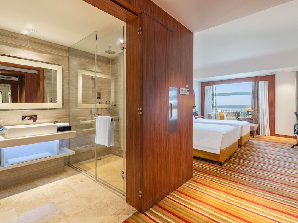 Habitación Premier Piso Ejecutivo con Dos Camas Individuales del hotel Novotel Zhengzhou Convention Centre. Foto 6