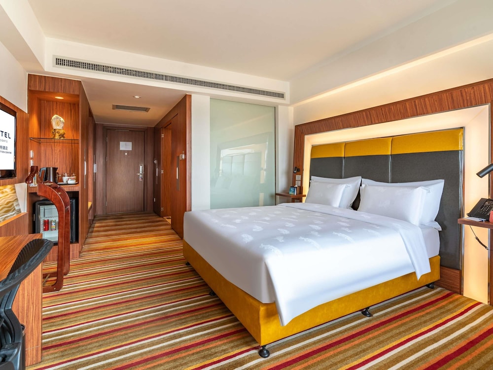 Habitación Premier Piso Ejecutivo con 1 Cama King del hotel Novotel Zhengzhou Convention Centre. Foto 9