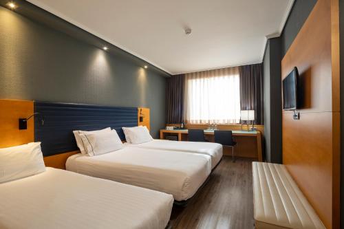 Habitación Doble con cama supletoria - 1 o 2 camas del hotel Eurostars Indautxu. Foto 1
