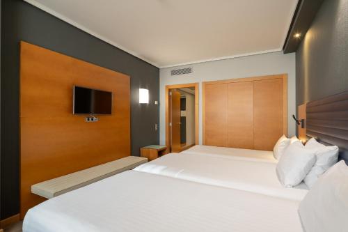 Habitación Doble con cama supletoria - 1 o 2 camas del hotel Eurostars Indautxu. Foto 2