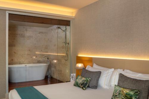 Suite Premium con terraza del hotel The Artist Grand Of Art. Foto 4