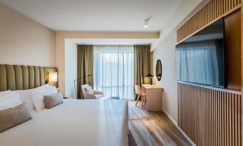 Suite con vistas al río del hotel Barceló Bilbao Nervión