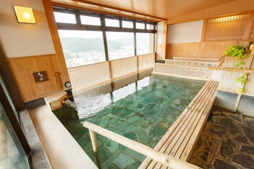 Habitación Doble de estilo japonés - occidental - 2 camas del hotel Hida Hanasatonoyu Takayama Ouan. Foto 1