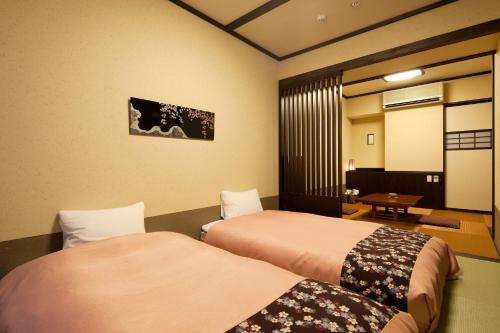 Habitación Doble de estilo japonés - occidental - 2 camas del hotel Hida Hanasatonoyu Takayama Ouan. Foto 2