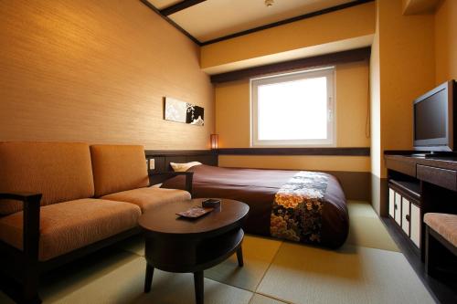 Habitación Doble Estándar del hotel Hida Hanasatonoyu Takayama Ouan. Foto 1