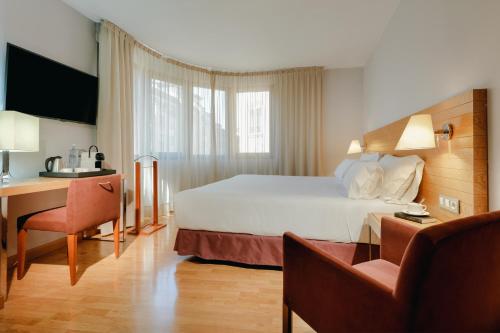 Habitación Doble Estándar - 1 o 2 camas del hotel Hesperia Zaragoza Centro. Foto 1