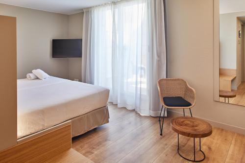 Habitación Doble con terraza - 1 o 2 camas del hotel Silken Reino De Aragón. Foto 13