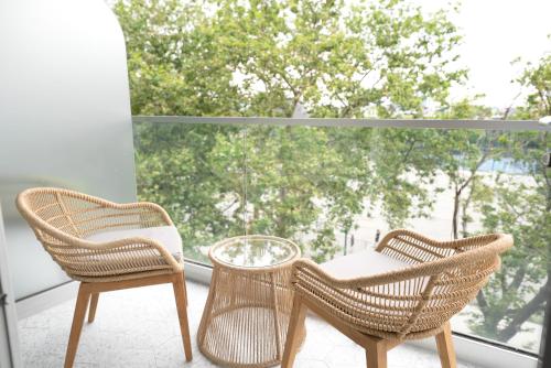 Habitación Superior con balcón - Cama extragrande del hotel CODA Williamsburg. Foto 3