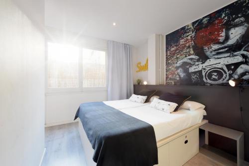 Habitación doble con balcón del hotel Free Hostels Barcelona. Foto 1