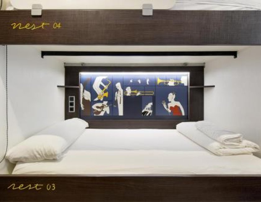 Habitación Cuádruple del hotel Free Hostels Barcelona. Foto 5
