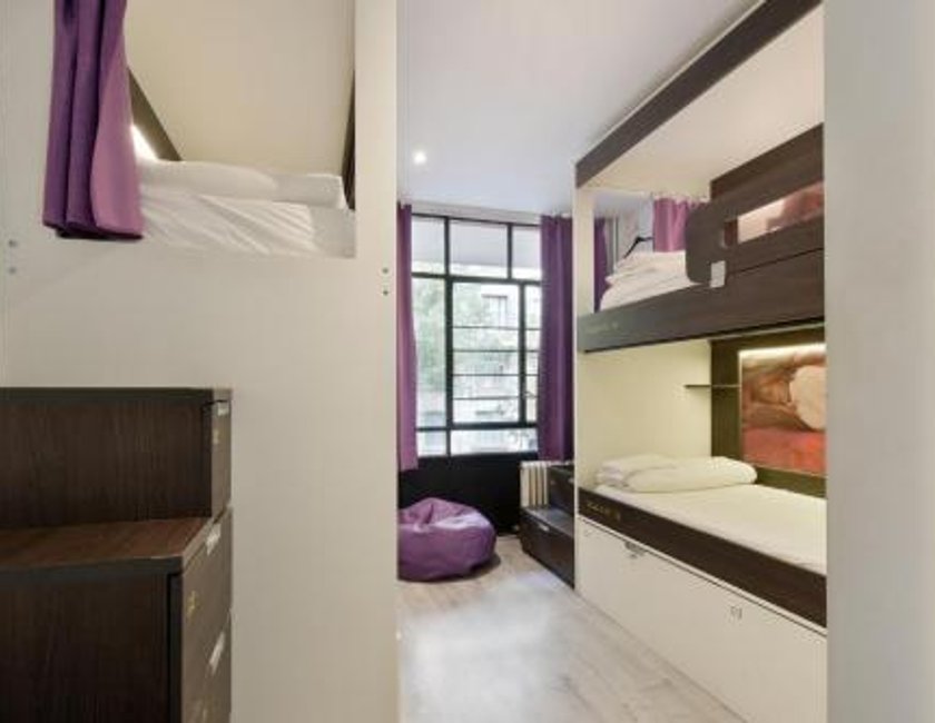 Habitación Cuádruple Clásica del hotel Free Hostels Barcelona. Foto 4