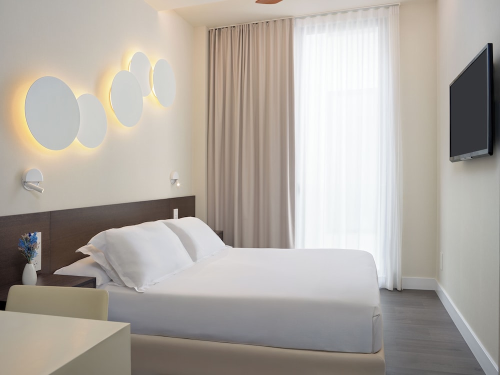 Habitación Classic del hotel H10 Port Vell. Foto 4