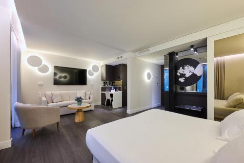 Habitación Superior Atrium del hotel H10 Port Vell. Foto 1