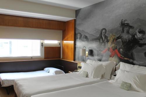 Habitación Doble con cama supletoria del hotel Goya