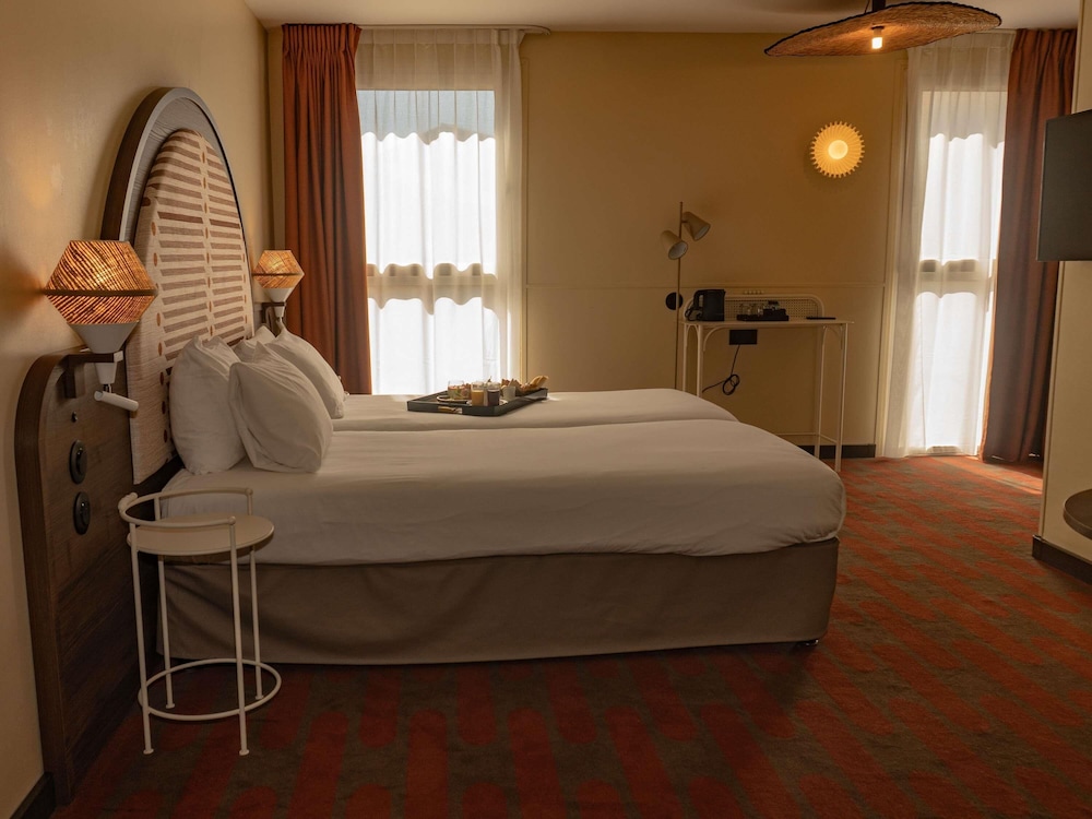 Habitación clásica, 2 camas individuales del hotel Mercure Arles Centre Arenes. Foto 5