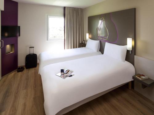 Habitación Doble Estándar - 2 camas del hotel Ibis Styles Lleida Torrefarrera. Foto 1
