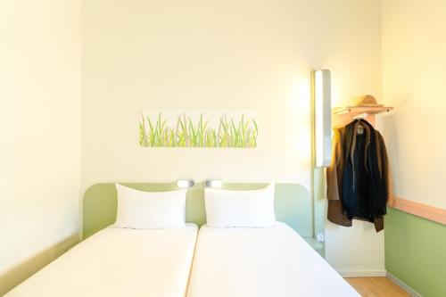 Habitación Doble - 2 camas del hotel Ibis Budget Madrid Calle Alcalá. Foto 12