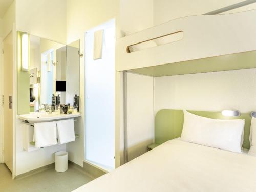 Habitación Doble con litera del hotel Ibis Budget Madrid Calle Alcalá. Foto 3
