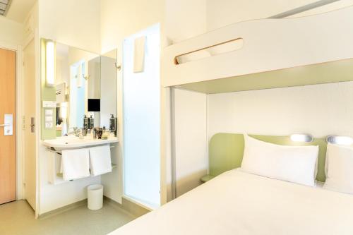 Habitación Doble con litera del hotel Ibis Budget Madrid Calle Alcalá. Foto 5