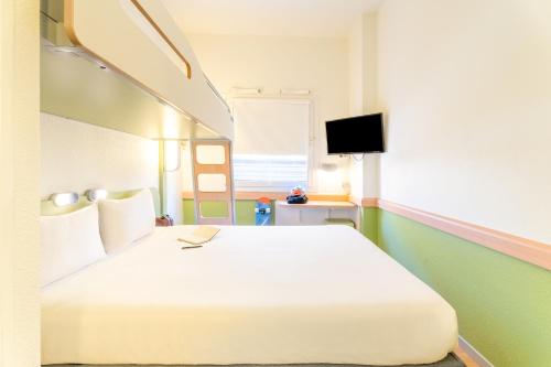 Habitación Doble con litera del hotel Ibis Budget Madrid Calle Alcalá. Foto 6