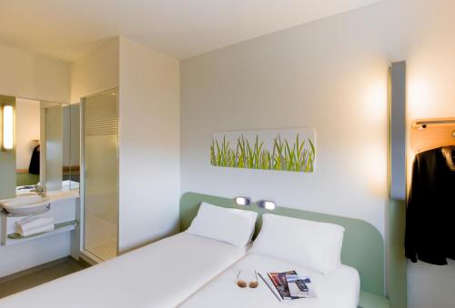 Habitación Doble - 2 camas del hotel Ibis Budget Madrid Centro Las Ventas. Foto 4