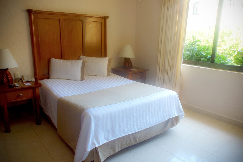 Habitación estándar del hotel All Ritmo Cancun Resort and Water Park. Foto 5