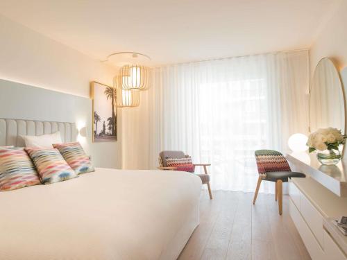 Habitación DELUXE 2 camas individuales, balcón del hotel Croisette Beach Cannes - Mgallery. Foto 4