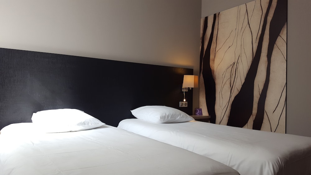 Habitación Clásica con camas individuales del hotel Mercure Colmar Centre Unterlinden. Foto 1