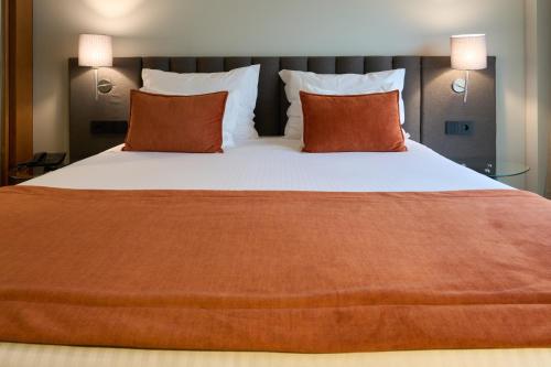 Habitación Doble con cama supletoria del hotel Versatile. Foto 4
