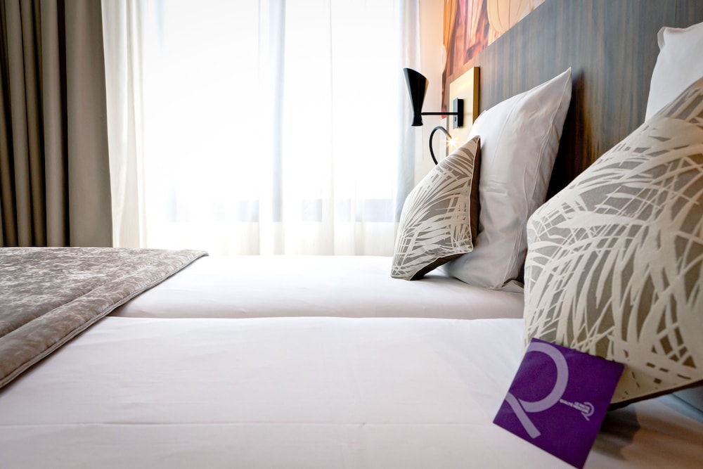 Habitación Classic con dos camas individuales del hotel Mercure Lyon Centre Plaza République. Foto 1