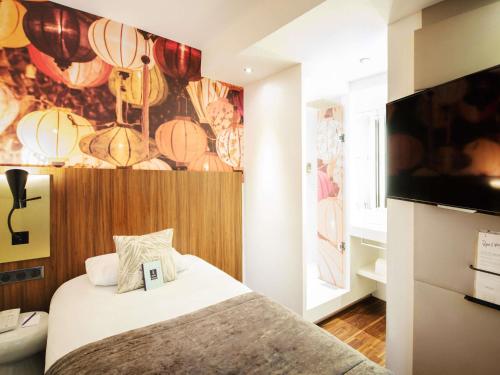 Habitación Standard con 1 cama individual del hotel Mercure Lyon Centre Plaza République. Foto 3