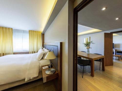 Suite Prestige con vistas al río del hotel Sofitel Lyon Bellecour. Foto 7